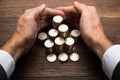 Businessman's Hand Protecting Euro Coins Royalty Free Stock Photo