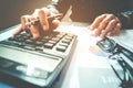 Businessman`s hands with calculator at the office and Financial Royalty Free Stock Photo