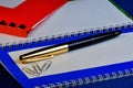 Write a plan or report in a notebook, folder, stationery pen. Royalty Free Stock Photo