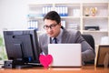 The businessman in saint valentine concept in office