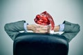 Businessman with a santa hat relaxing in his office chair Royalty Free Stock Photo