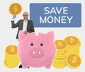 Businessman saving money in a piggy bank Royalty Free Stock Photo