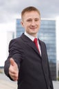 Businessman saying welcome Royalty Free Stock Photo