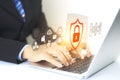 Businessman scan fingerprint with virtual screen interface to enter internet network.Futuristic virtual screen interface