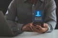 Businessman scan their face with a mobile smartphone to unlock and access personal data