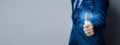 Businessman scans fingerprint with encrypted hologram to enter business management system, encryption secure sensitive data, set