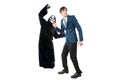 Businessman Scared of a Man Wearing a Ghost Costume on Halloween Royalty Free Stock Photo