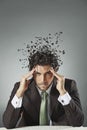 Businessman with scattered mind