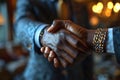 Businessman sealing a deal with a handshake in close up, business meeting image Royalty Free Stock Photo