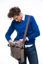 Businessman searching documents in his bag Royalty Free Stock Photo