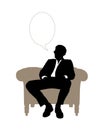 Businessman seated in beige classical armchair speaking