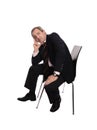 Businessman seated on a chair Royalty Free Stock Photo
