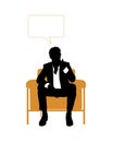 Businessman seated in orange armchair and thinking Royalty Free Stock Photo