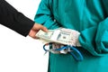 Businessman secretly handed the money to Female doctor, Corruption and bribe concept in medicine and health care