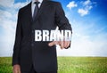 Businessman selecting brand word