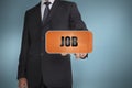 Businessman selecting orange tag with job