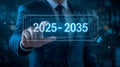 Businessman selects future years 2025-2035 on digital interface Royalty Free Stock Photo