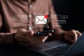 Businessman sending email by laptop computer to customer, business contact and communication, email icon, email marketing concept Royalty Free Stock Photo
