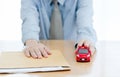 A Businessman sent filing for car loan. document and small red car