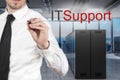 Businessman in modern server room writing it support in the air, 3D Illustration Royalty Free Stock Photo