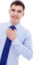 Businessman sets straight his tie Royalty Free Stock Photo