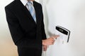 Businessman Setting Home Security Alarm System Royalty Free Stock Photo