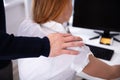 Businessman Sexually Harassing Female Colleague Royalty Free Stock Photo