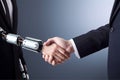 Businessman shake hand with robot, close up