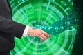 Businessman shaking hand with digital partners hand on green futuristic background