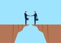 Businessman shaking hands on cliff. Business connection, partnership, cooperation interaction concept.