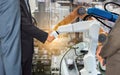 Businessman shaking hands cooperation with robot robotic arm future industry Royalty Free Stock Photo