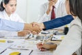 Businessman shaking hands to seal a deal with his partner Royalty Free Stock Photo