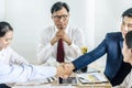 Businessman shaking hands to seal a deal with his partner Royalty Free Stock Photo