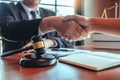 Businessman shaking hands to seal a deal Judges male lawyers Consultation legal services Consulting in regard to the various Royalty Free Stock Photo