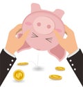 Businessman Shaking Money Coin Out of Cute Piggy Bank, Business Royalty Free Stock Photo