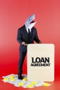 Businessman with a shark head depicting as a loan shark with red background