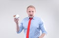 Businessman in a shirt with a red tie with cup of coffee ready for action. Bussines model poster concept Royalty Free Stock Photo