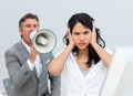 Businessman shouting through a megaphone Royalty Free Stock Photo