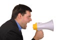 Businessman shouts in megaphone Royalty Free Stock Photo