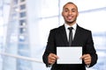 Businessman showing a blank business card Royalty Free Stock Photo