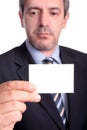Businessman showing a businesscard Royalty Free Stock Photo