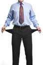 Businessman showing empty pockets Royalty Free Stock Photo