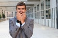 Businessman showing hysteria close up