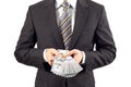 Businessman showing new hundred dollar bills Royalty Free Stock Photo