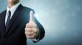 Businessman showing OK or hand sign thumb up, The excellence of Royalty Free Stock Photo