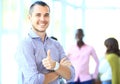 Businessman showing OK sign with his thumb up. Royalty Free Stock Photo