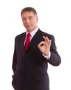 Businessman showing perfect gesture. Hand sign excellent, good, great, okay, yes. Royalty Free Stock Photo