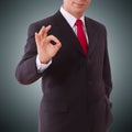 Businessman showing perfect gesture. Hand sign excellent, good, great, okay, yes. Royalty Free Stock Photo