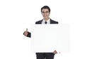 Businessman showing placard and thumb sign Royalty Free Stock Photo