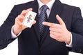 Businessman showing playing card. Royalty Free Stock Photo